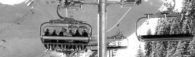 Skiers in a chairlift